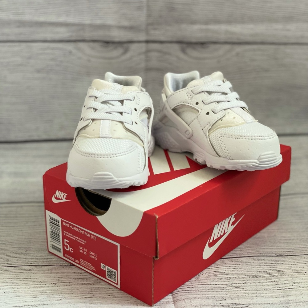 Nike Huaraches in white size 5C. Brand new.